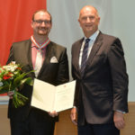 Landesordensträger Torsten Karow mit Ministerpräsident Dietmar Woidke, Foto Oliver Lang
